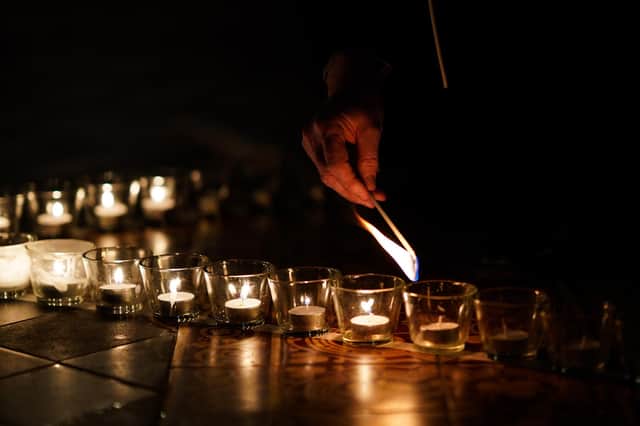 Candles shaped as a Star of David for Holocaust Memorial Day, which takes place on January 27 every year. Photo by Ian Forsyth/Getty Images