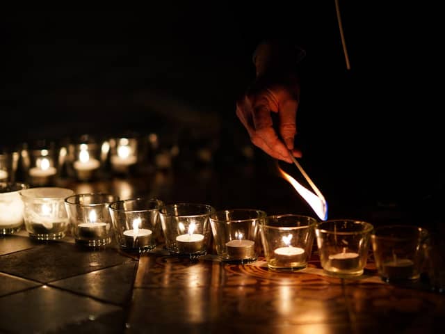 Candles shaped as a Star of David for Holocaust Memorial Day, which takes place on January 27 every year. Photo by Ian Forsyth/Getty Images