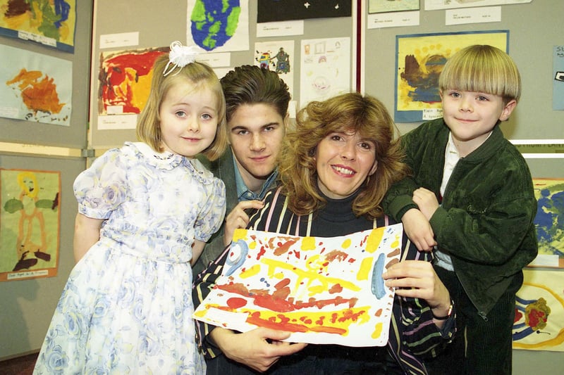 TV presenter Maggie Philbin came to the Science and Technology Fair at Sunderland University in April 1994. Four year old Jade Jones, left, Michael Robbie, 17 of Plains Farm and Adam Edward, six of Barnes Park got to meet her.