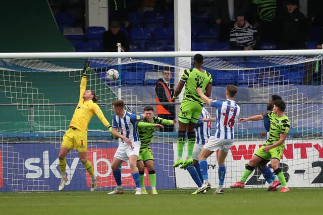 Forest Green's Jordan Moore-Taylor beats Hartlepool United's  Ben Killip to put them 1-0 up during the Sky Bet League 2 match between Hartlepool United and Forest Green Rovers at Victoria Park, Hartlepool on Saturday 20th November 2021. (Credit: Mark Fletcher | MI News)