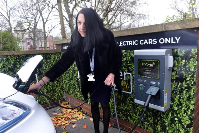 Clair Gilbraith boosts a vehicle using one of the station's new charging points .