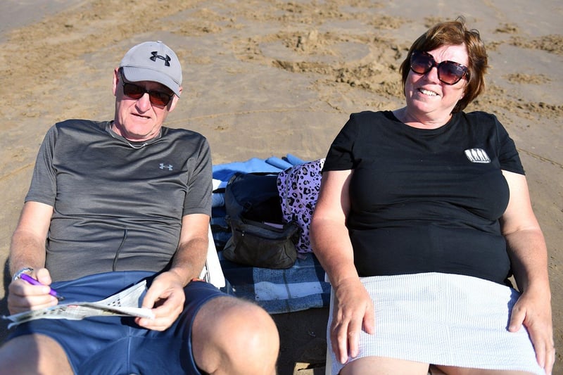 Ray and Liz Lower relaxing in the sun at Seaton Carew. Picture by FRANK REID.