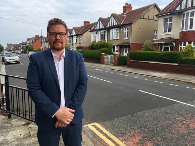 Burn Valley ward councillor Jonathan Brash on Park Road where a lollipop woman was injured after being involved in a collision with a car.