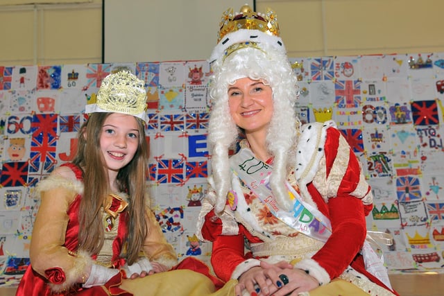 Pupil Megan Glover with Foundation Stage leader Gillian Hood who was enjoying her 40th birthday in royal style 10 years ago.