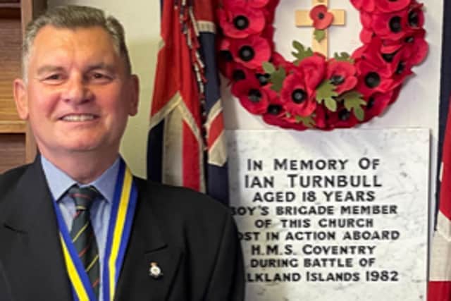 Ian Simpson by the memorial stone at Eighth Hartlepool Boys Brigade.