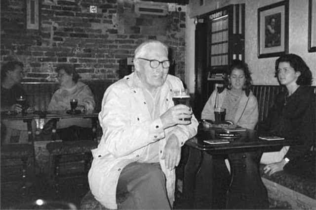 The late Dennis Lendrem enjoying a pint during his retirement.