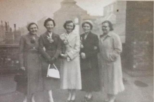 The 'Wales ladies' on the roof of the Central Stores following the wedding reception of Irene Wales in the Co-op cafe in the late 1940s. Photo courtesy of Shirley Sumpter.