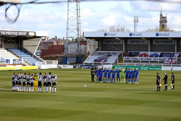 The players mark the death of HRH Price Philip during the Vanarama National League match between Hartlepool United and Notts County at Victoria Park, Hartlepool on Saturday 10th April 2021. (Credit: Chris Booth | MI News)