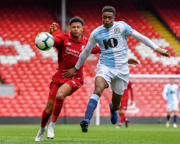 Rhian Brewster of Liverpool and Tyler Magloire of Blackburn Rovers in action during the PL2 match at Anfield on April 28, 2019 in Liverpool, England. (Photo by Nick Taylor/Liverpool FC/Liverpool FC via Getty Images)