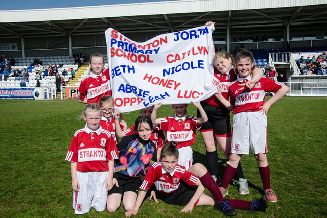 Stranton Primary School pupils celebrate their win against Clavering during the football school finals.