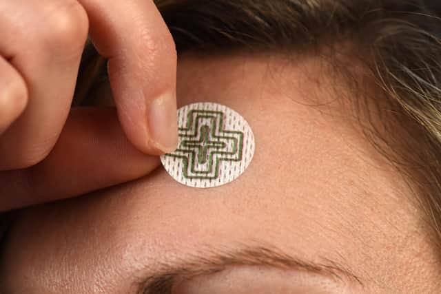 The VTi discs are worn on the forehead and change colour in seconds if the wearer's temperature gets too high.