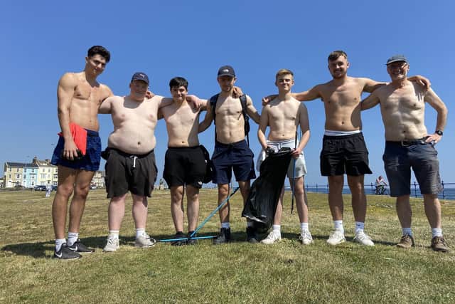 Hartlepool College of Further Education students with instructor Paul Frank, right, litter picking at Seaton Carew during hot weather last June.