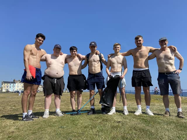 Hartlepool College of Further Education students with instructor Paul Frank, right, litter picking at Seaton Carew during hot weather last June.