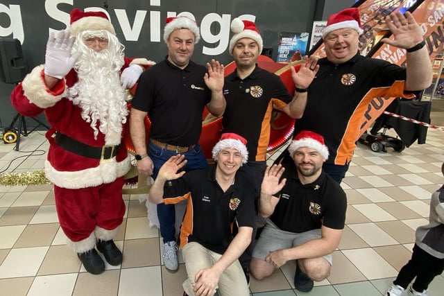 Members of Hartlepool Round Table greet Santa as he arrives at Middleton Grange Shopping Centre. Picture by FRANK REID