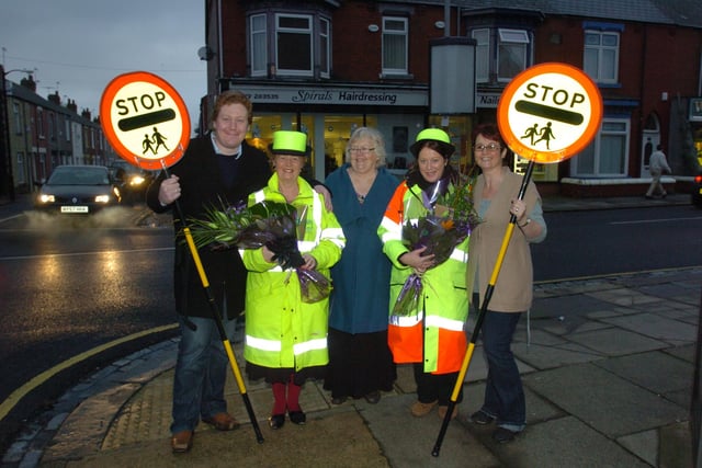 Elwick Road School lollipop ladies Valeria Laws and Suzanne Honeyford are presented with flowers by, from left, Jonathan Brash, Eileen Mulcahy and Dawn Robinson, in 2009.