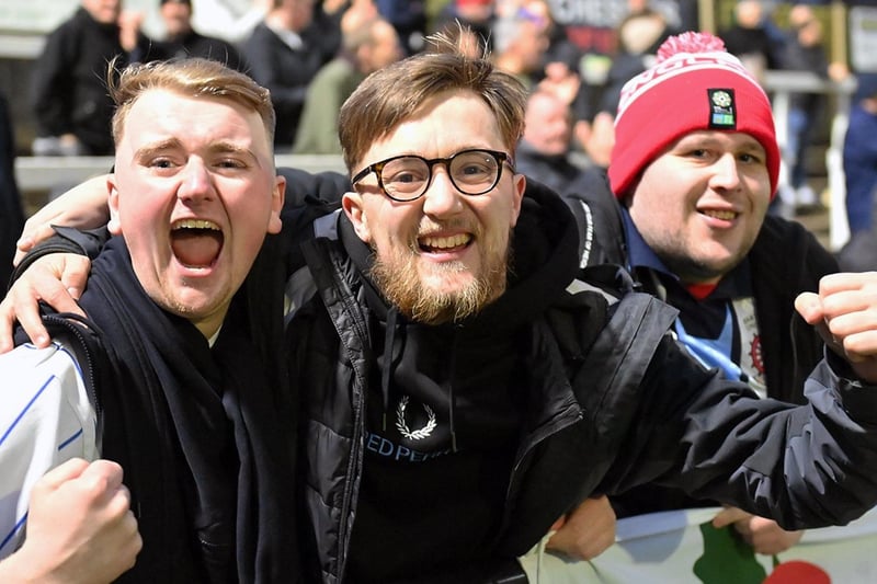 These Hartlepool fans can't hide their joy after the result. Picture by FRANK REID.