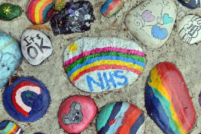Pebbles and stones painted by villagers during pandemic have been set in concrete at Hart Primary School