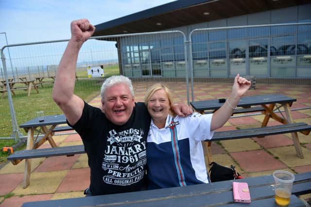 Celebration as Hartlepool United FC final against Torquay at Hornsey's. Fans David Capocci and Lesley Flounders.