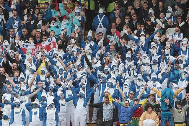 Hartlepool United fans dress up as smurfs during the League One match with Charlton Athletic at The Valley in 2012.  (Photo by Phil Cole/Getty Images)
