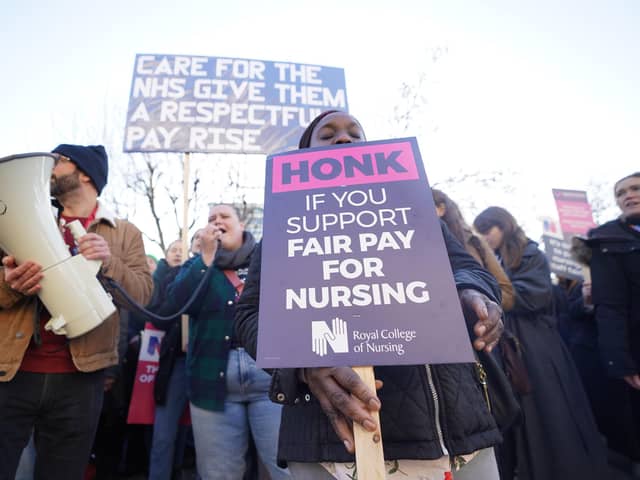Members of the Royal College of Nursing (RCN) on the picket line outside St Thomas' Hospital, central London. Continued strike action plus winter pressures are jeopardising the ability of the NHS to break out of a "vicious cycle", a health leader has said. Issue date: Wednesday January 18, 2023.