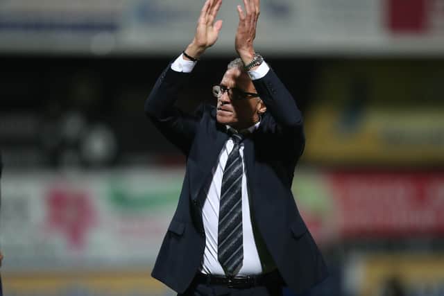 Keith Curle applauds the travelling Hartlepool United supporters after their 2-2 draw with Mansfield Town. (Credit: Mark Fletcher | MI News)