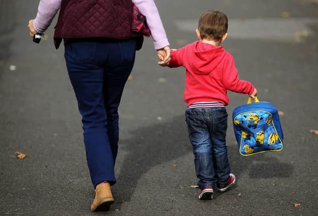 Families are urged not to miss out on free school transport support. Photo: PA