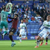 Joe Murphy of Tranmere Rovers FC makes a save under pressure from Tyler Burey of Hartlepool United FC during the Sky Bet League 2 match between Tranmere Rovers and Hartlepool United at Prenton Park, Birkenhead on Saturday 4th September 2021. (Credit: Ian Charles | MI News)