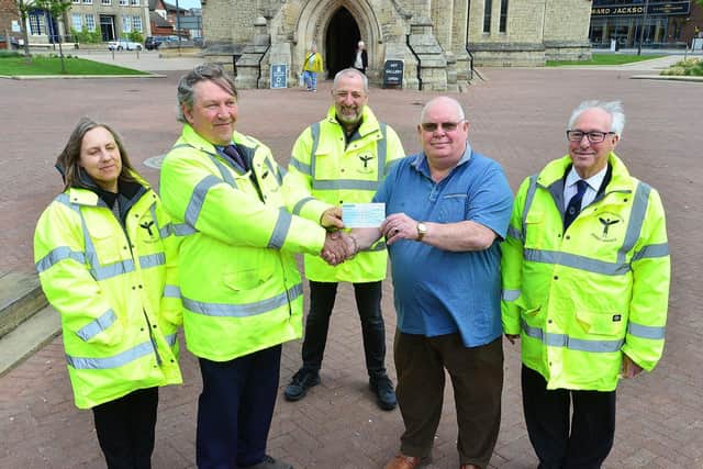 Peter Richardson from Hartlepool Harbour of Refuge Masonic Lodge presents a cheque for £300 to Terry Hegarty from Hartlepool Town Pastor joined by Street Angels Helen Pidd, Malcolm McAndrew and (right) Ken Shepherd. Picture by FRANK REID