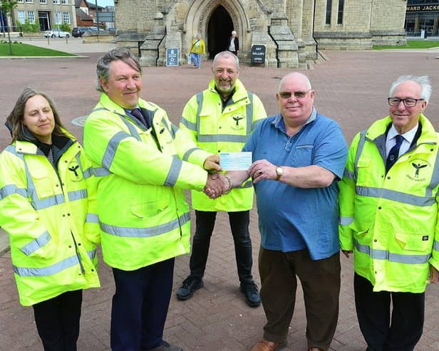 Peter Richardson from Hartlepool Harbour of Refuge Masonic Lodge presents a cheque for £300 to Terry Hegarty from Hartlepool Town Pastor joined by Street Angels Helen Pidd, Malcolm McAndrew and (right) Ken Shepherd. Picture by FRANK REID