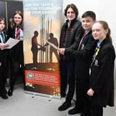 Kevin Wood (left) and Thomas Perkins from WOODSmith Construction with High Tunstall College of Science pupils Daisy Allen, Reggie MacSween, Grace Wood and Lily Coverdale. Picture By Frank Reid