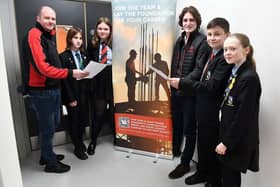Kevin Wood (left) and Thomas Perkins from WOODSmith Construction with High Tunstall College of Science pupils Daisy Allen, Reggie MacSween, Grace Wood and Lily Coverdale. Picture By Frank Reid