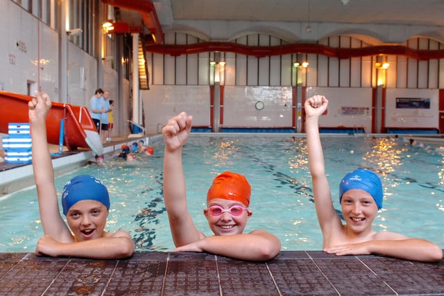 Pupils Kaleb Cairns, Megan Taubman and Jordan Allison celebrate the news that swimming will be free for everyone in Hartlepool aged under 16 during the school summer holidays in 2013.