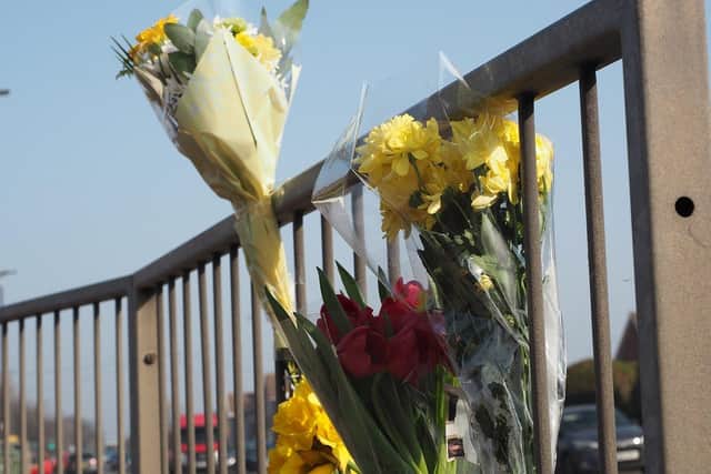 Flowers placed at the scene of the collision in Catcote Road, Hartlepool. Picture by FRANK REID.