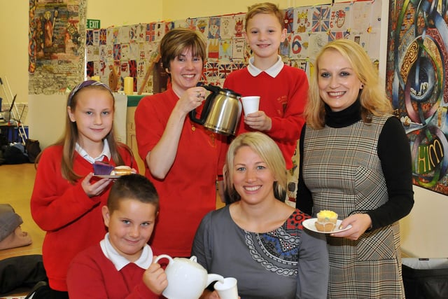 St Aidan's Primary School pupils and staff were serving up brews at a coffee morning held at the school a decade ago. UK Coffee Week arrives from October 17.