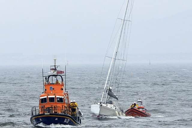 Hartlepool RNLI lifeboats pictured with the yacht which suffered mechanical failure. Credit: RNLI/Tom Collins.