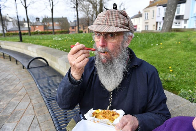 Geoff Lilley enjoying his fish and chip in the Croft Gardens. Picture by FRANK REID.