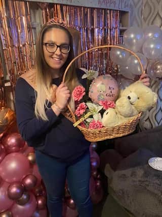 Chloe Bowman celebrates her 21st birthday with balloon from 1999.