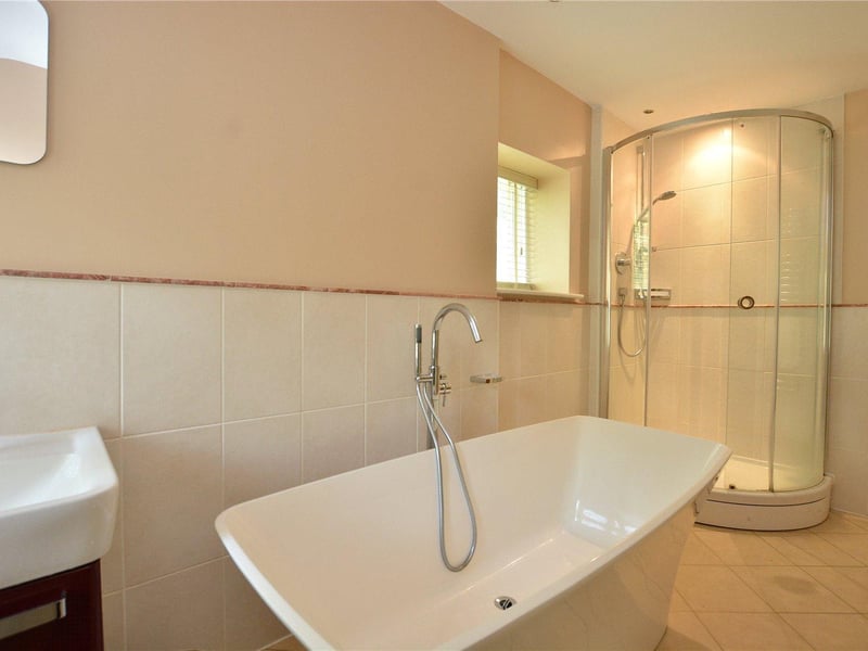 As well the en-suite, there is a large house bathroom complete with a freestanding bath, separate shower cubicle, wash hand basin and w/c.