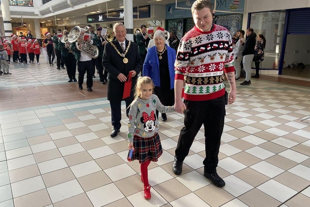 Emilia Foster and Kyle Woolhouse lead the parade as Santa arrives at Middleton Grange Shopping Centre. Picture by FRANK REID