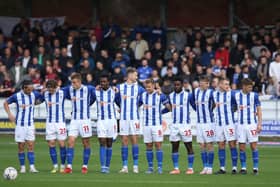 Hartlepool United stand in unison during the Sky Bet League 2 match between Salford City and Hartlepool United at Moor Lane, Salford on Saturday 16th October 2021. (Credit: Will Matthews | MI News)