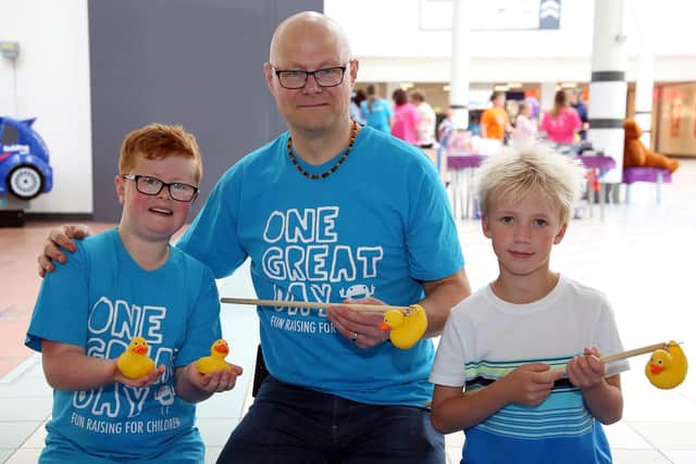 Middleton Grange manager Mark Rycraft (centre) with his 11-year-old son Calell (left) and his friend Alfie Linton aged 10, getting ready for the One Great Day event.