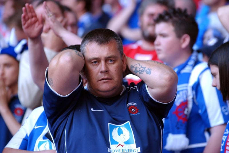 A Pools fans looks disconsolate as Sheffield Wednesday triumph 4-2 in the 2005 play-off final.