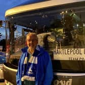 Author and Hartlepool United fan Stephen Poxon pictured next to the team coach.