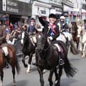 The cavalcade makes its way out of Berwick after receiving permission from the mayor to ride the bounds. Picture by Jane Coltman