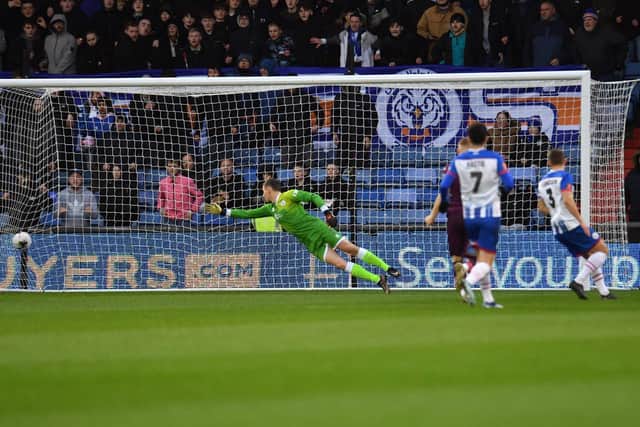 Hartlepool United goalkeeper Joel Dixon is beaten as Oldham Athletic take the lead at Boundary Park. Picture by FRANK REID