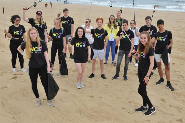 NCS volunteers on Sandhaven Beach as part of their clean up campaign in 2019. Can you spot someone you know?