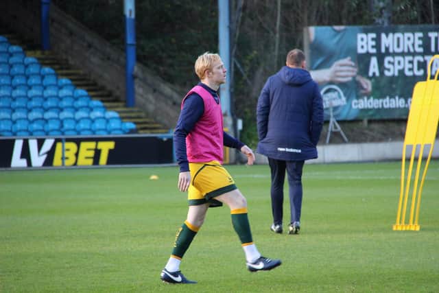 Luke Williams warming up for Hartlepool United at Halifax Town (photo: HUFC/Alex Chandy)