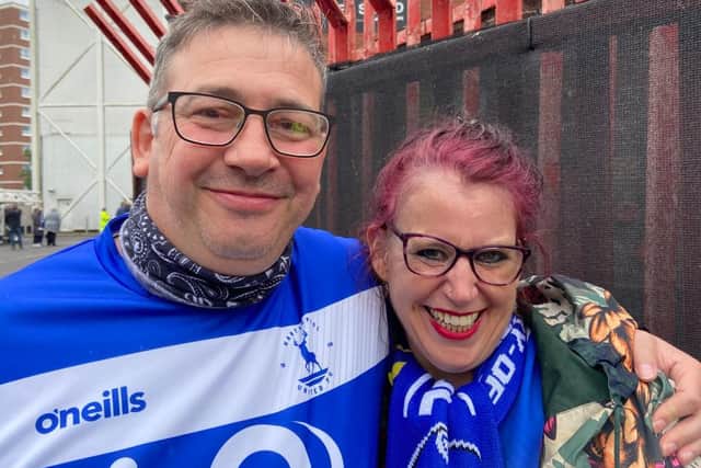 Russ Hoggart and partner Lisa Green outside Ashton Gate stadium where they decided to get engaged.
