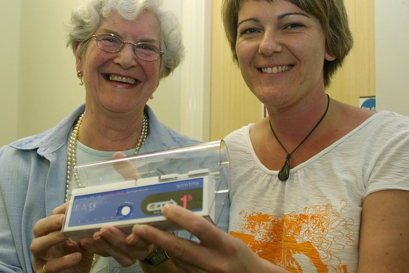 Elmwood Medical Centre Patient Participation Group member Dorothy Martin presented a syringe drive to senior district nurse Alison Webster in 2007