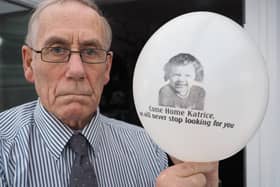 Richard Lee with a balloon featuring a photograph of his daughter Katrice. Picture by FRANK REID